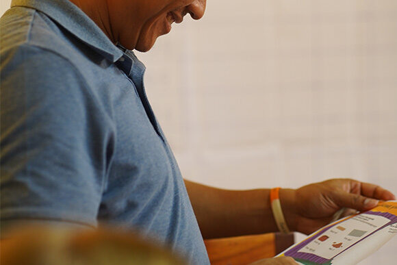 Potential sponsor reviewing brochure